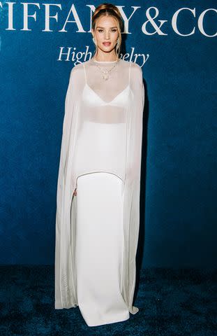 Olivia Munn graces the red carpet at the PEOPLE app launch, showcasing her signature style and elegance