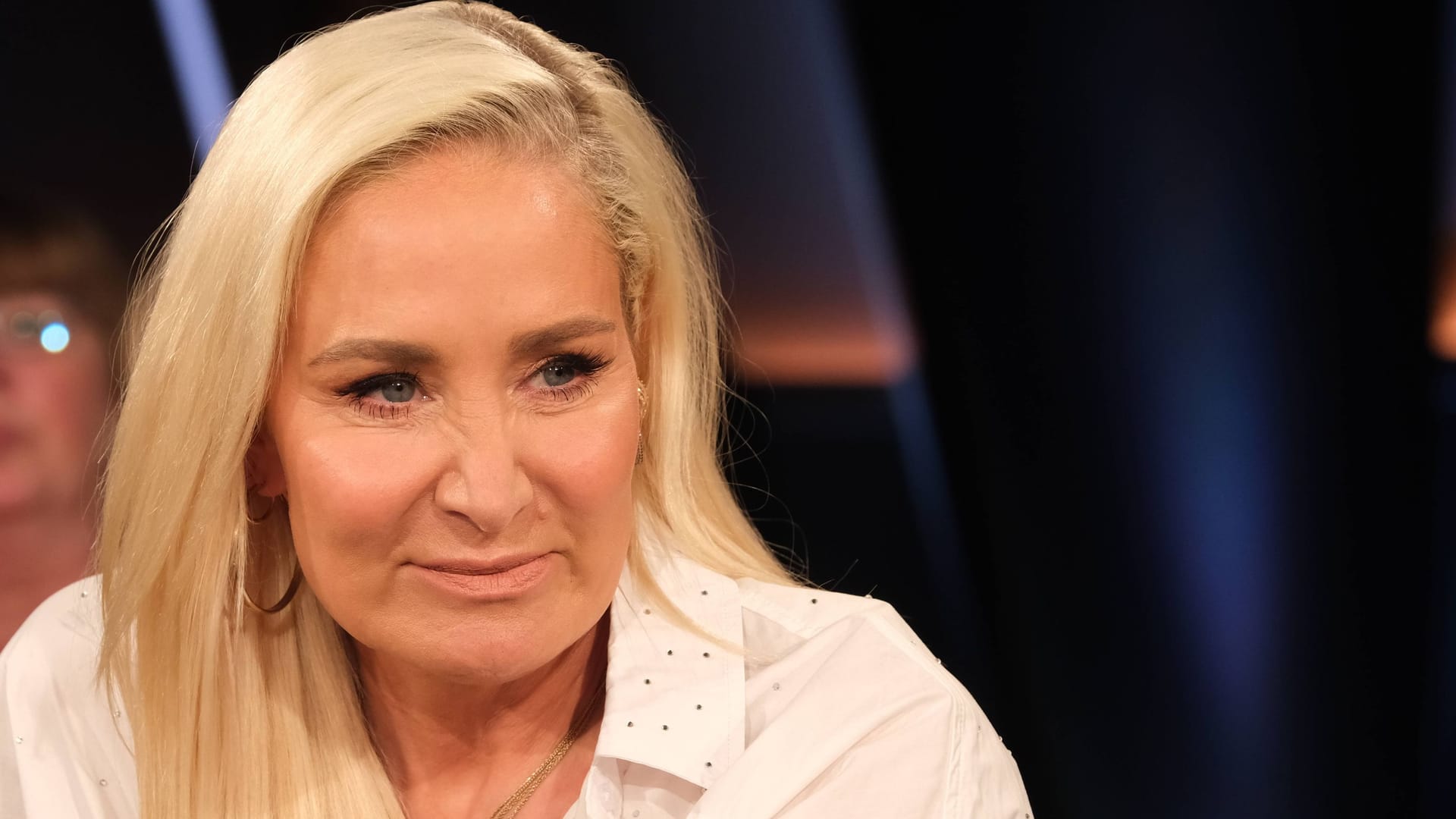 Janine Kunze lächelt, doch in schweren Zeiten steht Familie für sie an erster Stelle.
