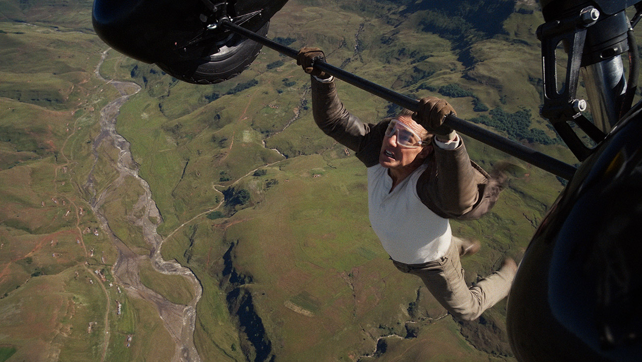 Tom Cruise on set of Mission: Impossible performing a daring stunt