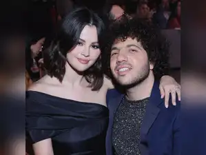 Benny Blanco and Selena Gomez at a public event, highlighting their relationship