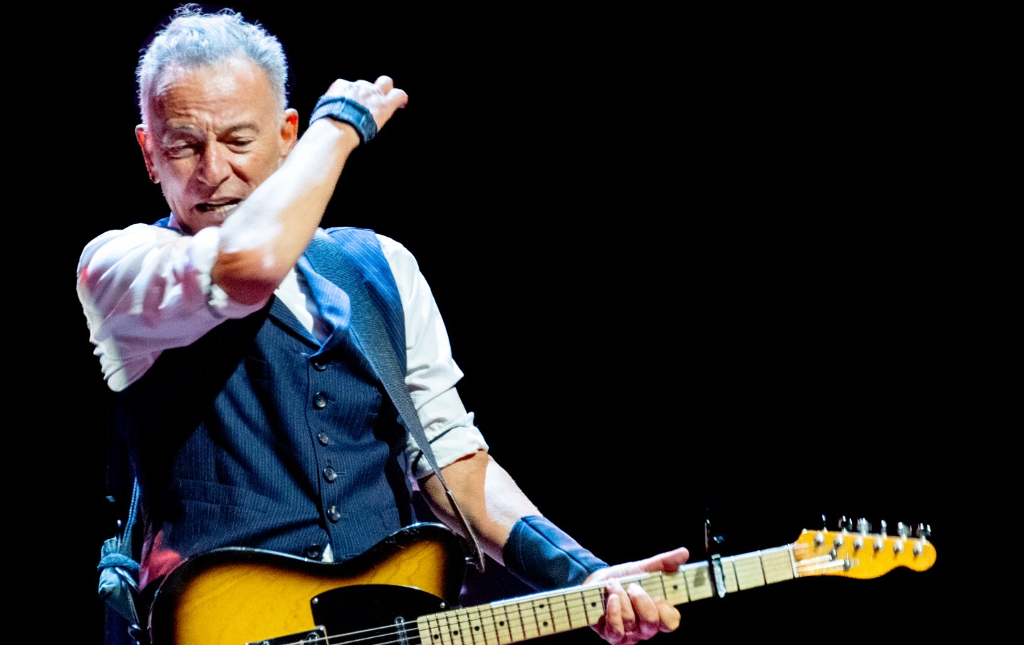 Bruce Springsteen performing live in Manchester, 2025 – a symbol of hope and resilience with the E Street Band.