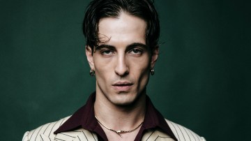 Maneskin performing live, captivating a global audience