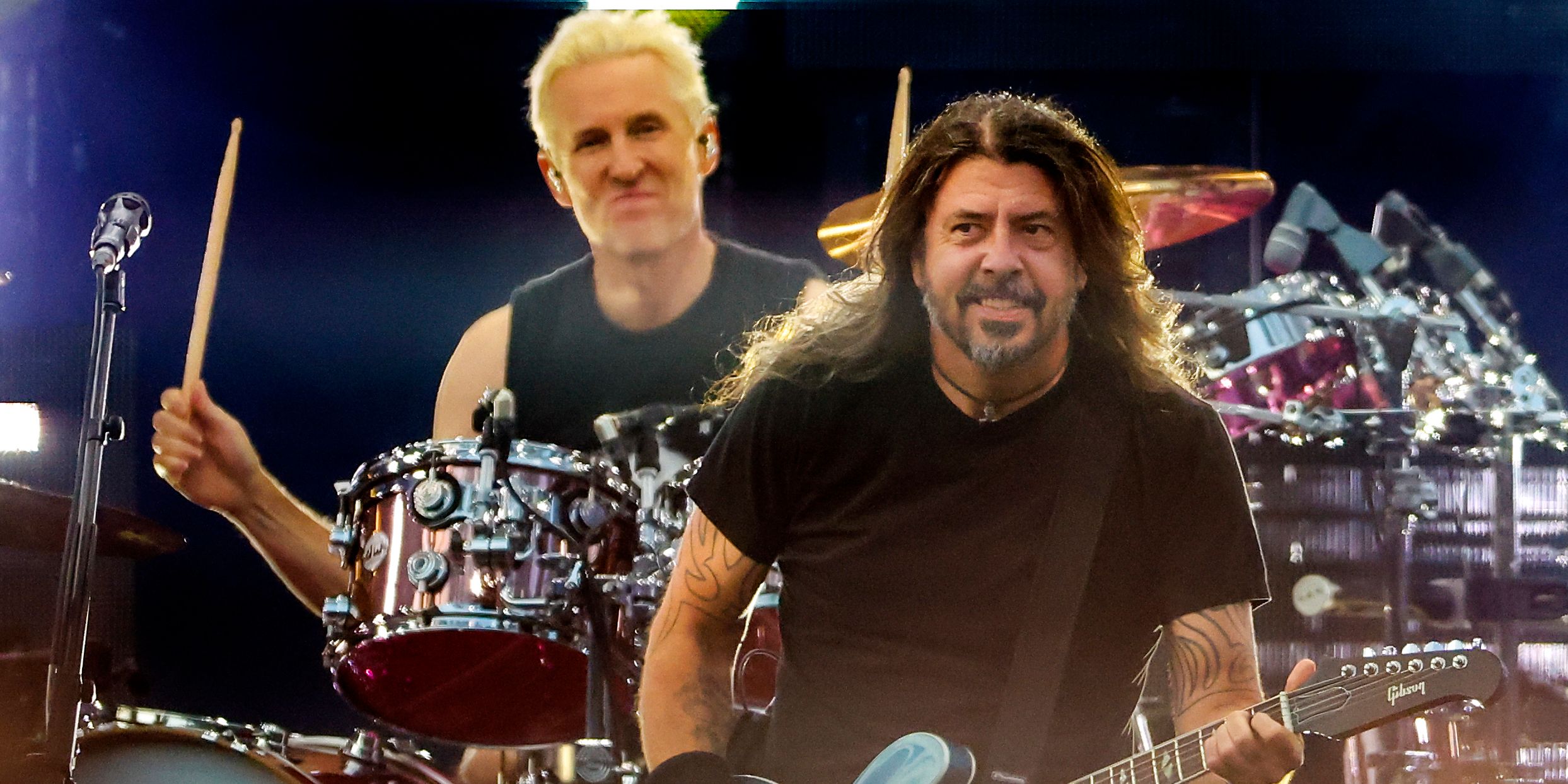Josh Freese performing on stage with the Foo Fighters