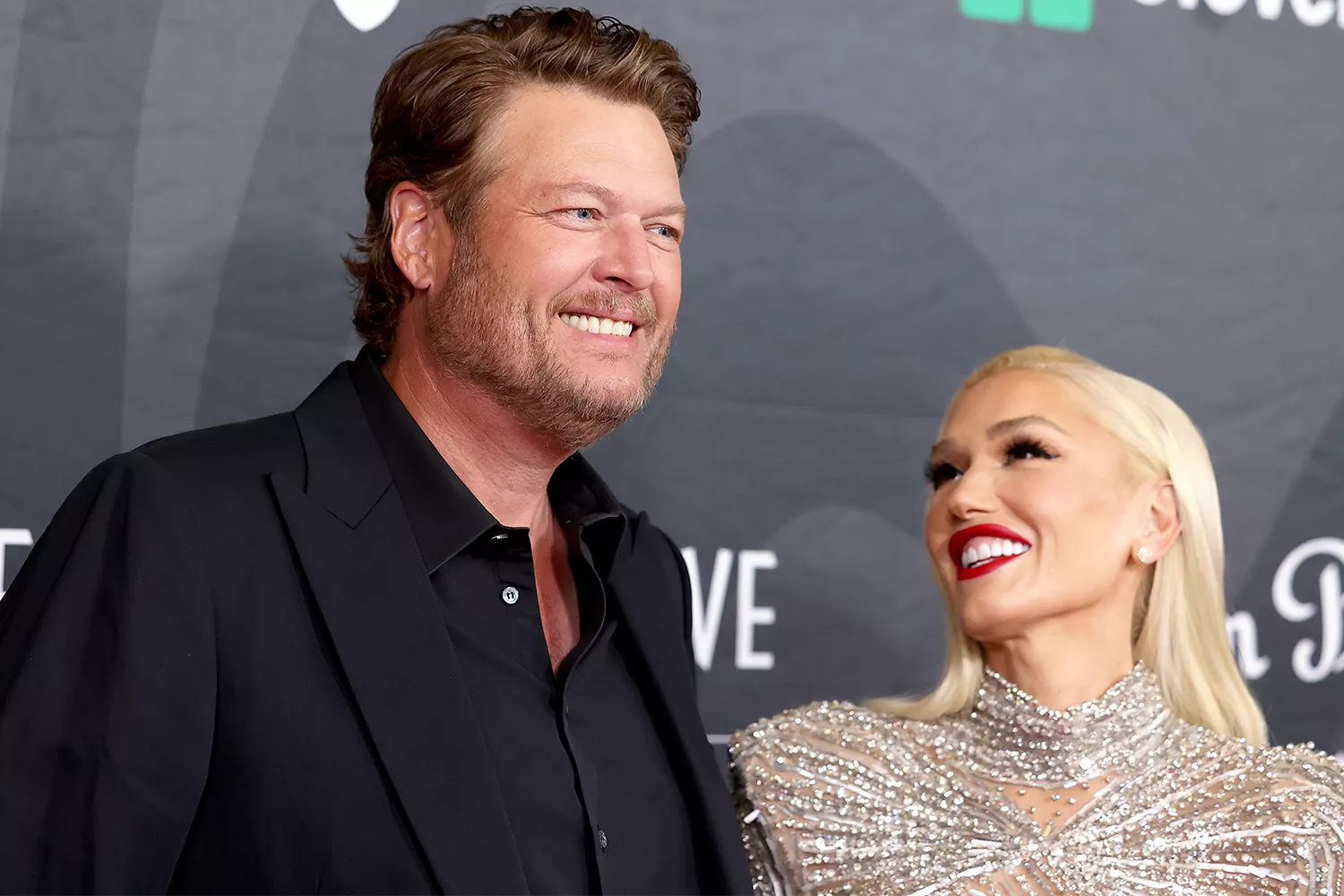 Gwen Stefani smiling alongside Blake Shelton at a Nashville event